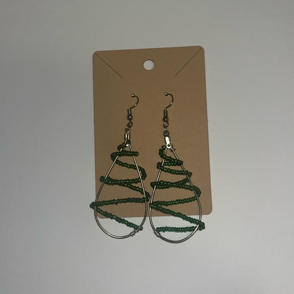 Gold teardrop hoop handmade earrings with a green bead wrap